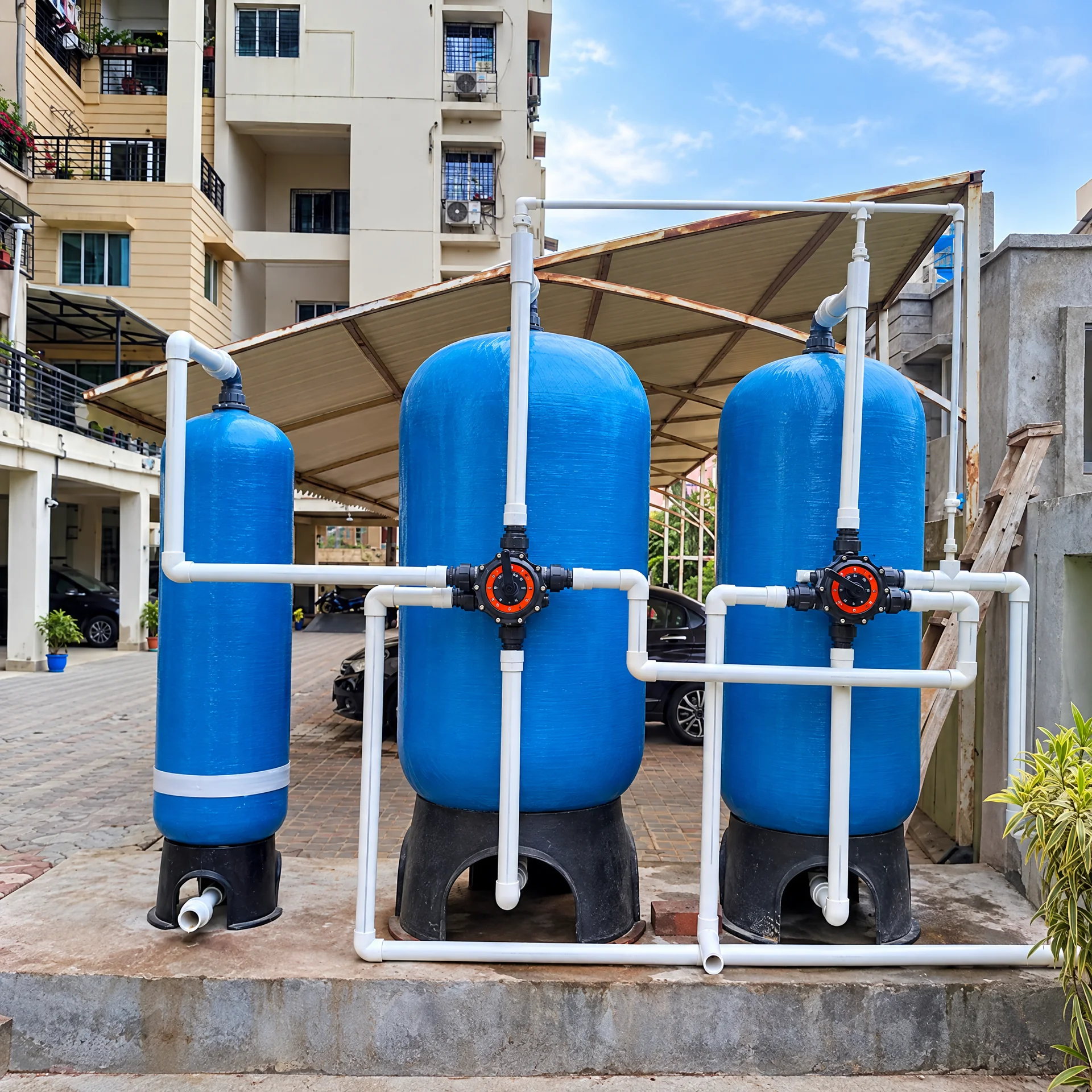 Water filter vessels and pressure tanks in industrial setting